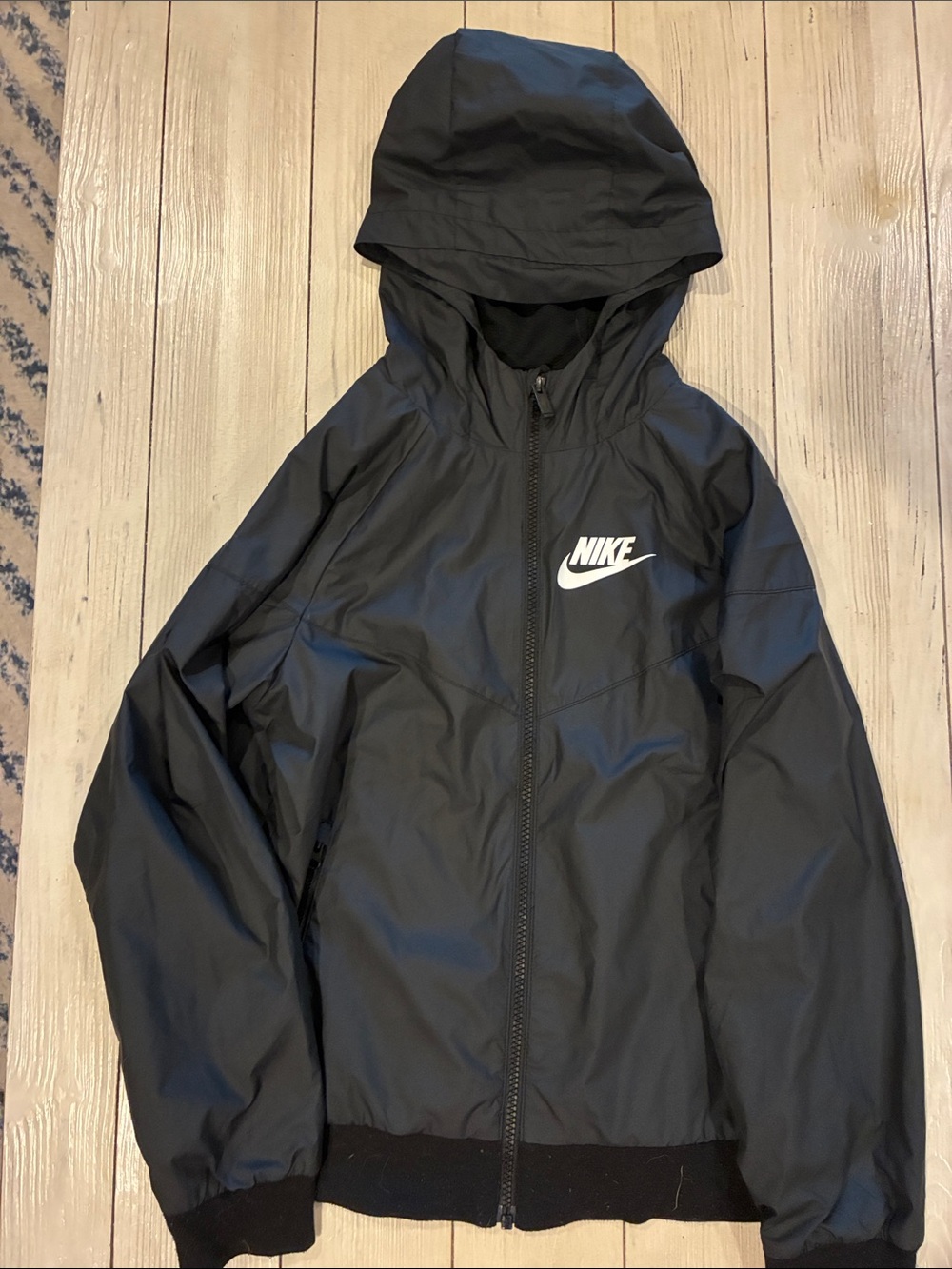 Nike Kids Black Hooded Rain Jacket with White Logo